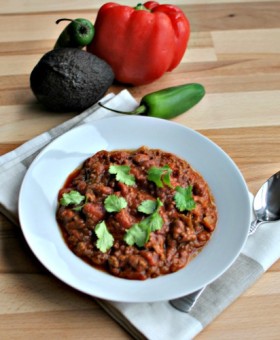 Spicy Saucy Slow Cooker Chili is a healthy recipe to warm you up on these chilly nights. Just throw all the ingredients in your slow cooker for 8 hours. | beckysbestbites.com