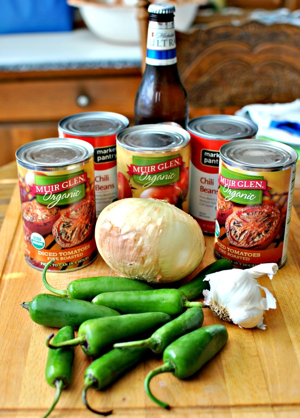 Spicy Saucy Slow Cooker Chili is a healthy recipe to warm you up on these chilly nights. Just throw all the ingredients in your slow cooker for 8 hours. | beckysbestbites.com