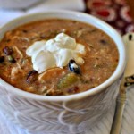 Skinny Slow Cooker Chicken Enchilada Soup has all the flavor of that comfort food favorite but none of the guilt! 