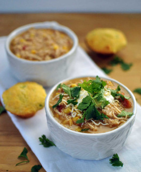 Healthy Slow Cooker White Chicken Chili warms the body and soul on any chilly day. Lean chicken, vegetables￼, beans & fresh herbs combine with greek yogurt for a healthy chili to feed a crowd on game-day or your family on any weeknight. | Becky's Best Bites