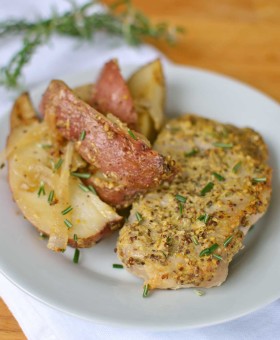 Roasted Rosemary Dijon Pork Chops and Potatoes is an easy one baking dish wonder! Fragrant rosemary and zesty dijon pair to make a flavorful basting sauce by Becky's Best Bites