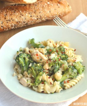 Guiltless Chicken Alfredo with Broccoli is a tasty and healthy recipe that uses a lighter version of the classic sauce. No butter, heavy cream or cream cheese but it is still creamy, thick and super flavorful! | Becky's Best Bites