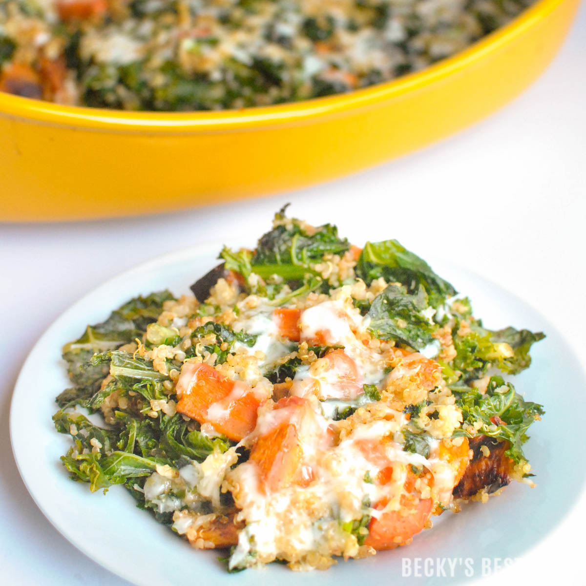 Kale & Roasted Vegetable Quinoa Casserole is a healthy, vegetarian, comfort food recipe that is great as a side dish or main meal. The leftovers make for fun lunches that will make your co-workers jealous ;) | beckysbestbites.com