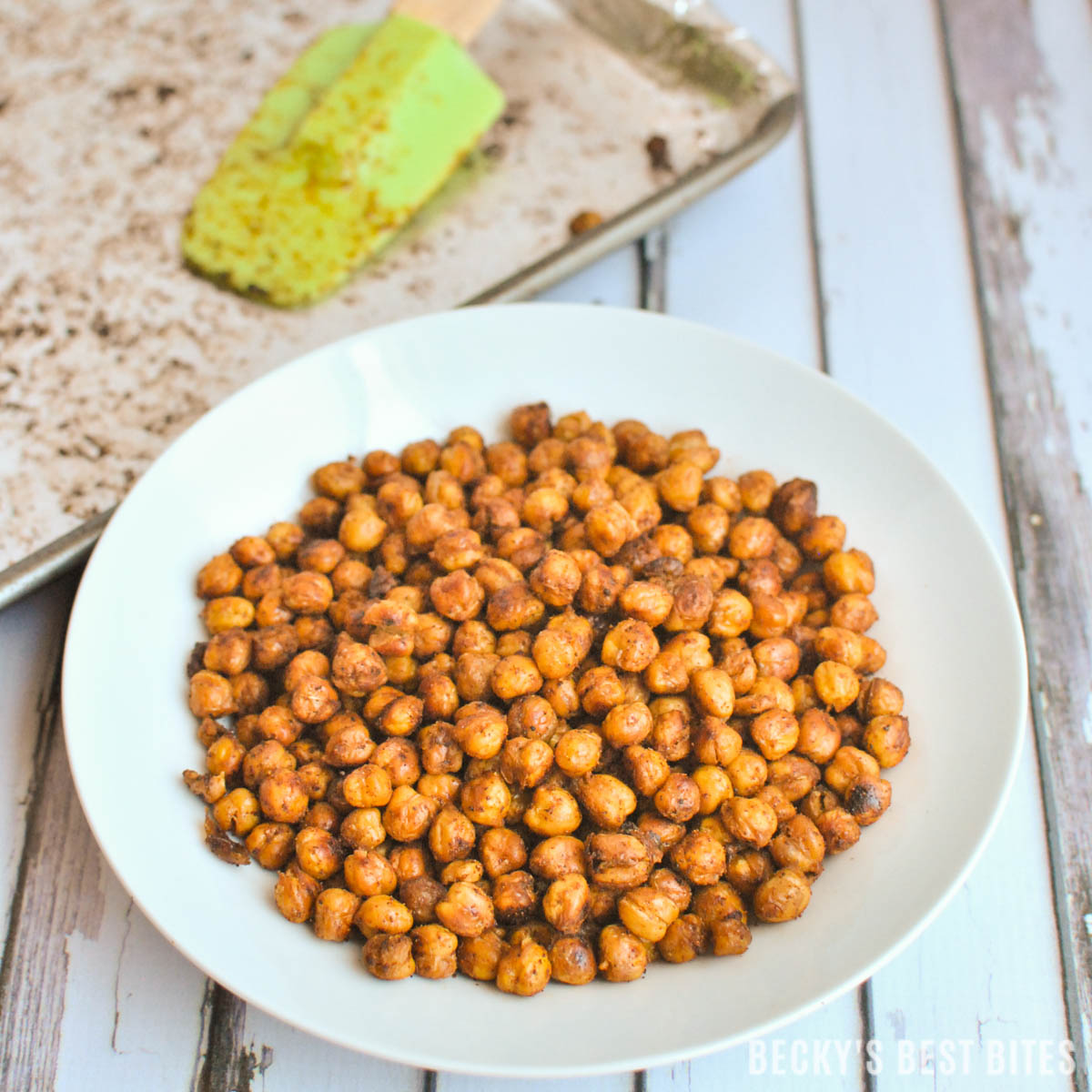 Smoky Spice Blend Roasted Chickpeas is a healthy recipe that is an ideal high fiber snack or appetizer. Throw a handful in salads for added crunch & texture. beckysbestbites.com