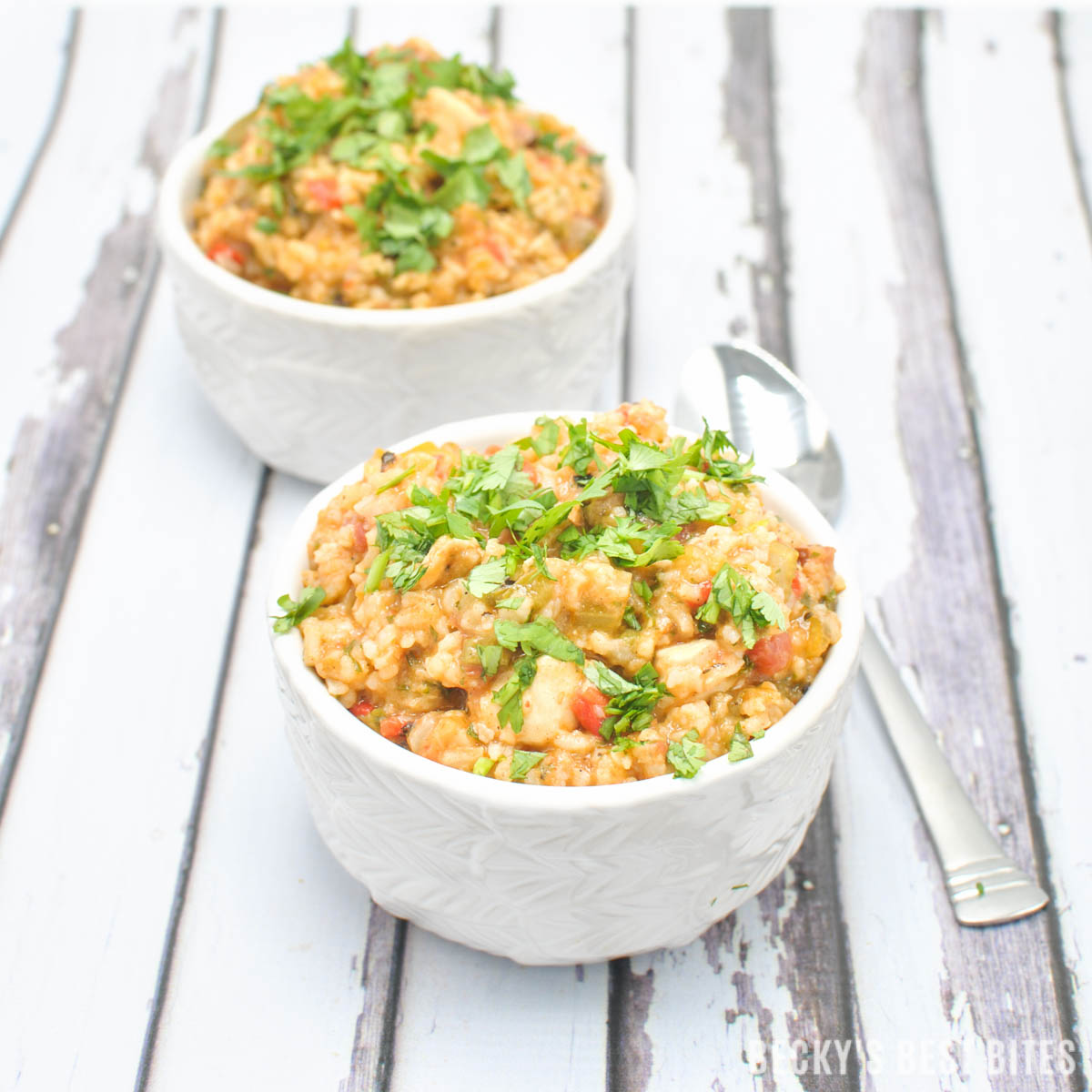 Hubby's Spicy Jambalaya Recipe is a Mardi Gras inspired meal to add to any game day spread. Protein packed dinner with smoked sausage, chicken and shrimp! | beckysbestbites.com