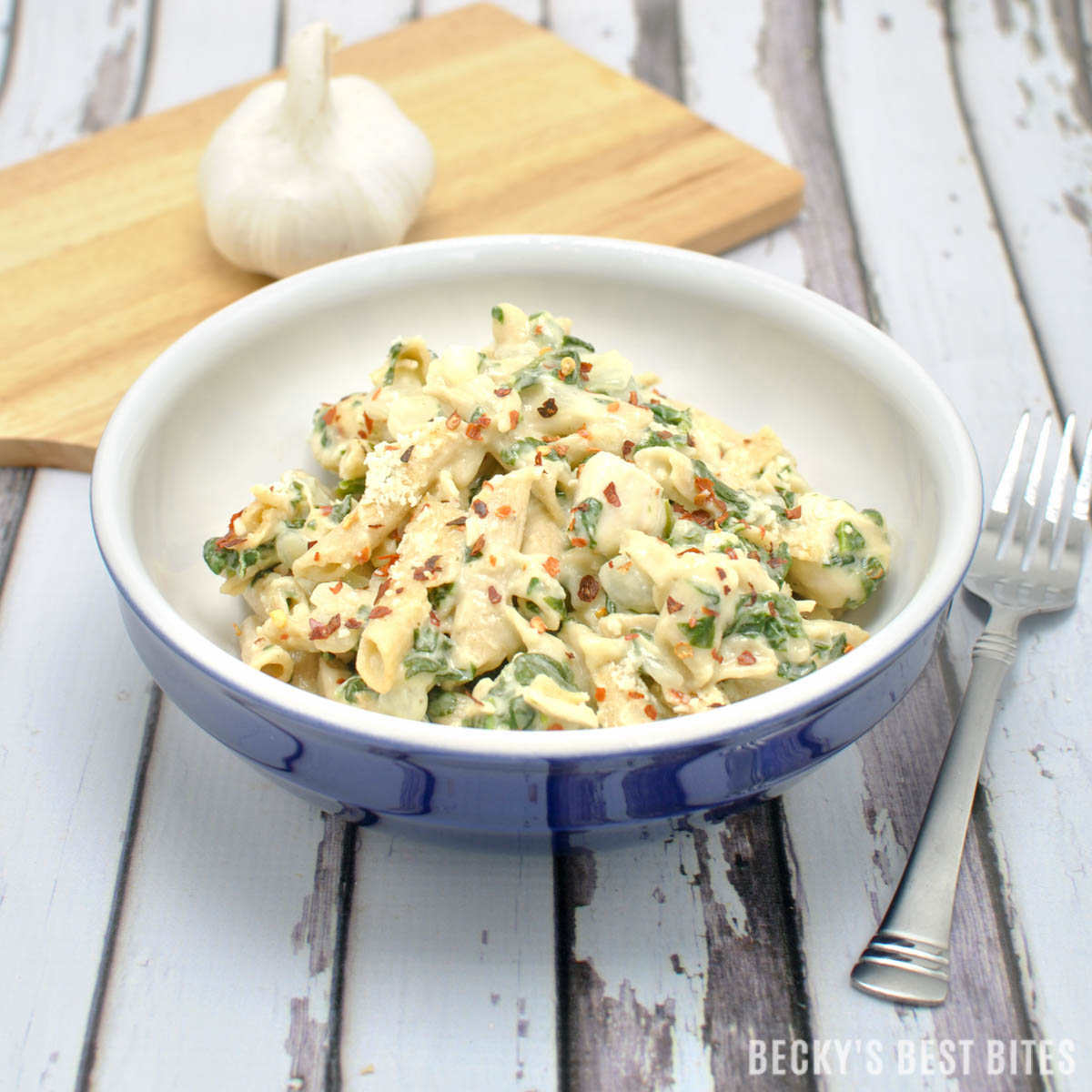 Skip the long waits at restaurants this weekend and make Creamy Garlic Spinach Chicken Pasta meal for your Valentine! This easy, healthy dinner recipe will melt their heart!! | beckysbestbites.com