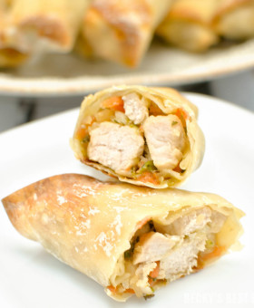 Pork and Vegetable Baked Egg Rolls are a healthy, crispy and delicious appetizer recipe served with a creamy spicy dipping sauce. No need to order take-out when you have this recipe in your wheelhouse! | beckysbestbites.com