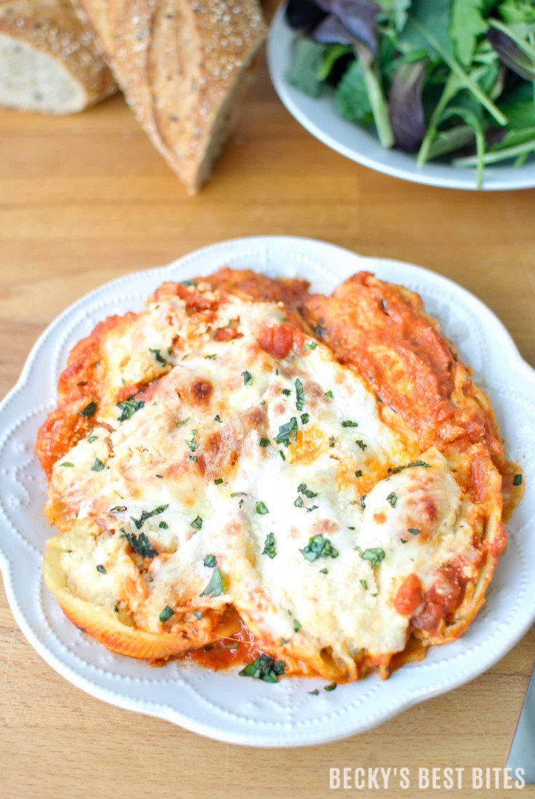 Chicken Ricotta Stuffed Shells with Kale is an easy Italian inspired meal with fresh seasonal produce for a large gathering with the help of Bertolli pasta sauces.| beckysbestbites.com #VivaBertolli #ad