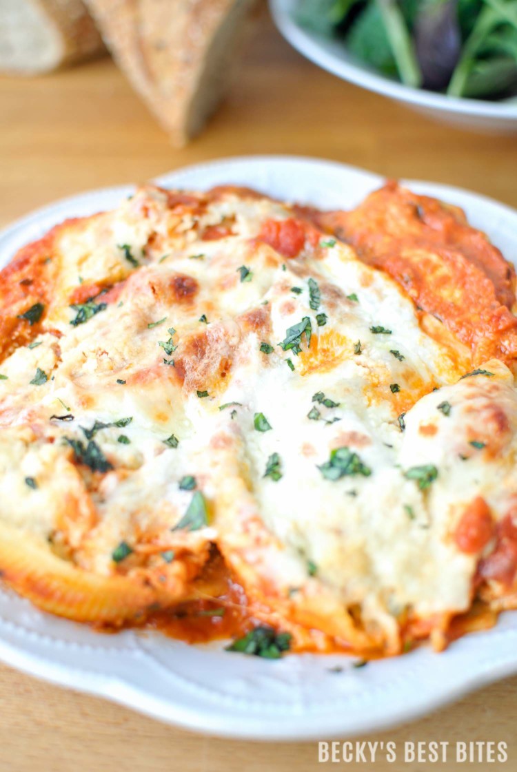 Chicken Ricotta Stuffed Shells with Kale is an easy Italian inspired meal with fresh seasonal produce for a large gathering with the help of Bertolli pasta sauces.| beckysbestbites.com #VivaBertolli #ad