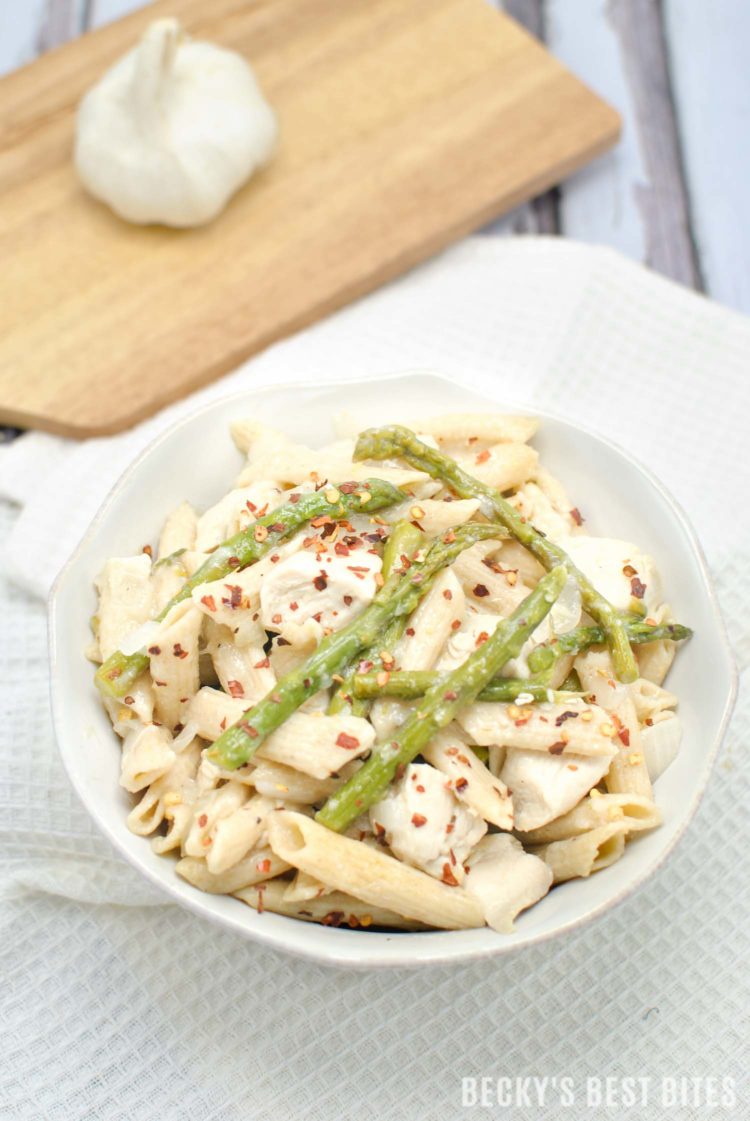 Easy Lemon Garlic Chicken Pasta with Asparagus is a healthy, weeknight dinner recipe with fresh spring flavors for a meal that the whole family will love! | beckysbestbites.com