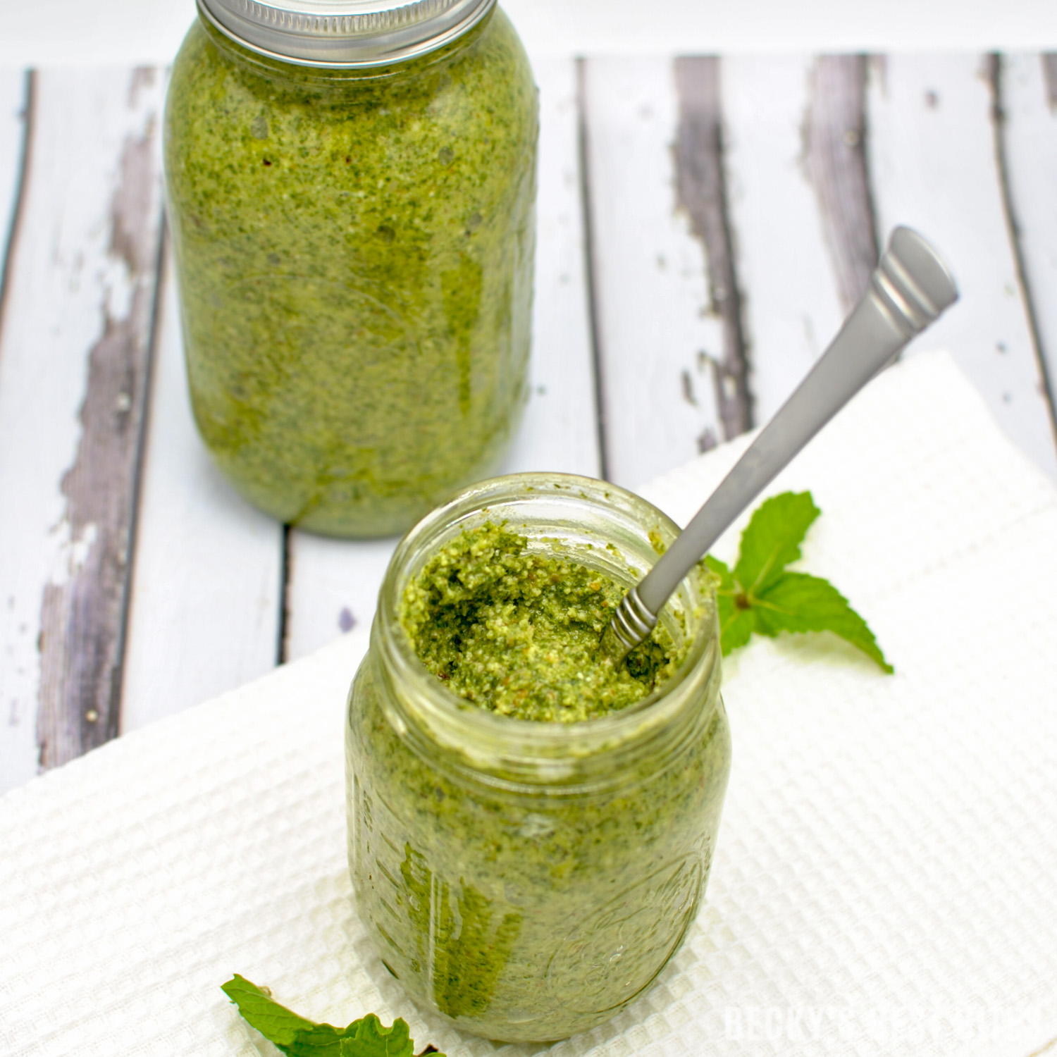 Lemon Mint Pesto is an unique version of the classic recipe. It is refreshing and bursting with summertime flavors! Also very versatile and can be used in just about anything from pasta dishes to chicken to seafood dinner meals. | beckysbestbites.com