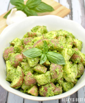 Summer Pesto Potato Salad is a healthy side that is perfect for any BBQ, cookout or other outdoor entertaining or party that you are having this holiday weekend. Impress your guests with this easy dish that is sure to please! | beckysbestbites.com