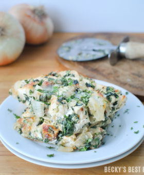 Goat Cheese, Spinach and Caramelized Onion Chicken Pizza is a delicious, frugal family dinner recipe when pizza cravings hit! Super easy and packed with veggies, fiber & protein, moms can feel better about serving this pizza then calling the local pizza delivery service!| beckysbestbites.com