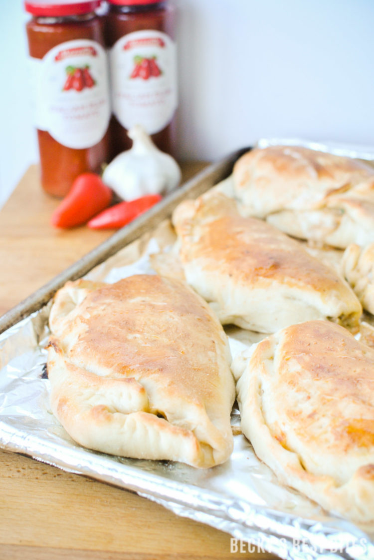 Turkey Sausage and Kale Calzones with Marinara Sauce | beckysbestbites.com