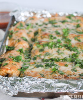 Veggie Packed Easy Chicken Enchiladas are perfect for family weeknight dinner & ready in 30 minutes. Be a kitchen pro and make cleanup a breeze by lining the pan with Glad™ Aluminum Foil before baking. | beckysbestbites.com