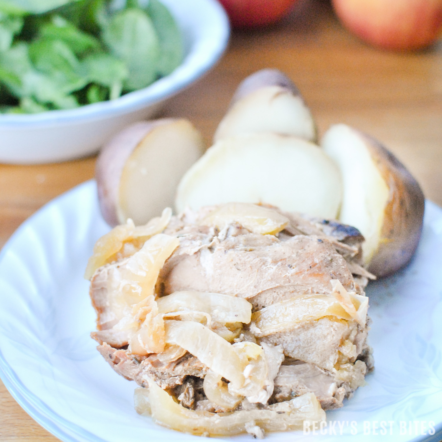 Slow Cooker Apple, Roasted Garlic & Herb Pork Loin with New Potatoes is an easy, family-friendly recipe perfect for busy fall schedules thanks to Smithfield® Marinated Fresh Pork! You just need ten minutes of prep in the morning to come home to a delicious fall meals that the whole family will love! #RealFlavorRealFast #ad | beckysbestbites.com