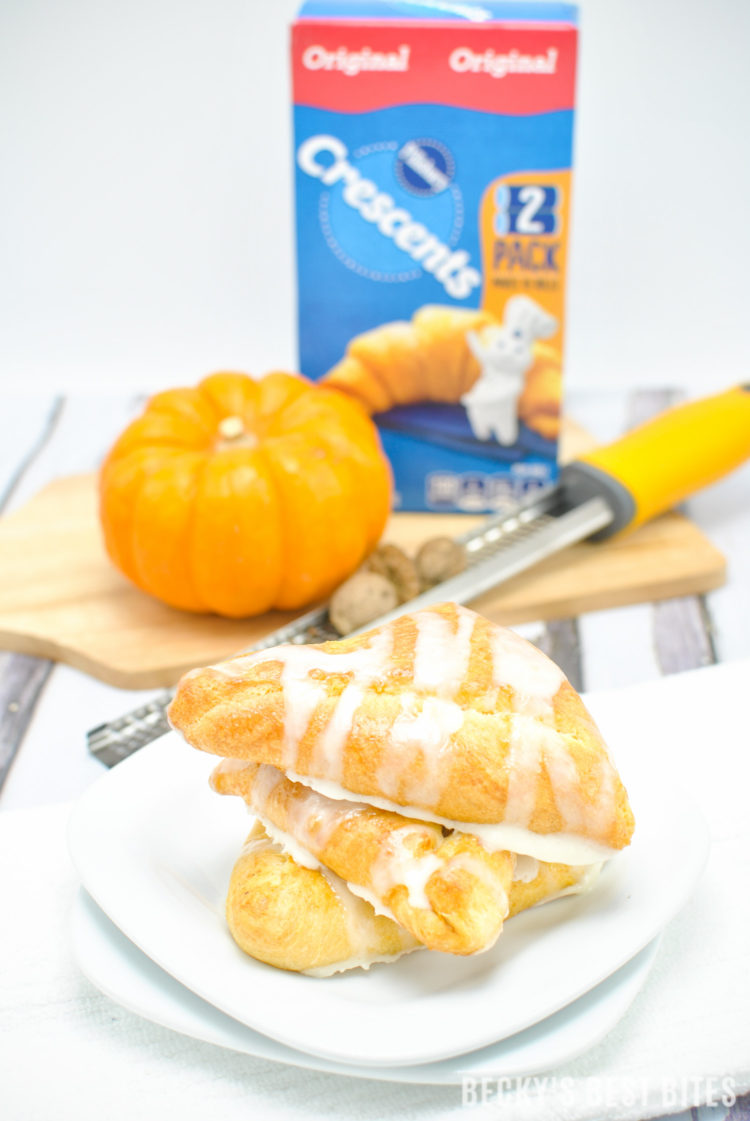 #ad Creamy Baked Pumpkin Pie Empanadas is healthier and easy dessert recipe perfect for Holiday entertaining made with a trusted brand, Pillsbury Crescent Rolls. They are mini kid-approved treats with all the flavors of the fall season and pumpkin pie while saving time to spend with family. #ItsBakingSeason | beckysbestbites.com