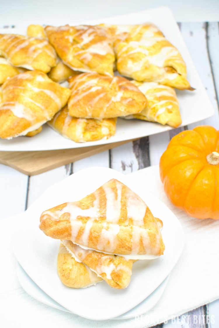 #ad Creamy Baked Pumpkin Pie Empanadas is healthier and easy dessert recipe perfect for Holiday entertaining made with a trusted brand, Pillsbury Crescent Rolls. They are mini kid-approved treats with all the flavors of the fall season and pumpkin pie while saving time to spend with family. #ItsBakingSeason | beckysbestbites.com