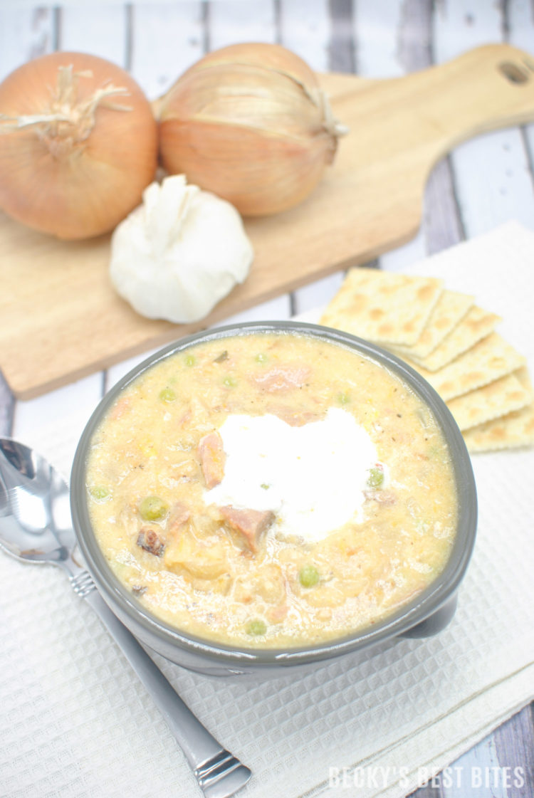 Slow Cooker Ham and Potato Soup is a quick, easy and yummy recipe way to use up those holiday leftovers! Reinvent the remaining, uneaten food into a comforting soup to warm you up on a chilly, winter night. | beckysbestbites.com