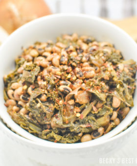 Slow Cooker Black-Eyed Peas with Kale and Garlic is an easy, tasty vegan recipe to kick off your healthy living/eating New Year's resolutions! Serve it as a vegetarian main dish that will satisfy even meat-eaters or hearty side dish to complement grilled meats. | beckysbestbites.com