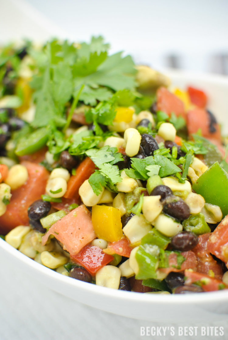 Southwest Black Bean and Corn Salad / Salsa is a beautiful, quick and easy side dish for grilled meats. Use as an healthy appetizer for a game day spread. | beckysbestbites.com