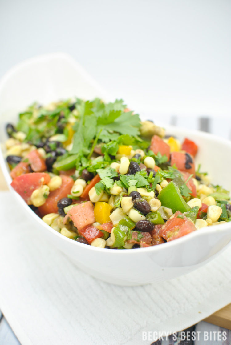 Southwest Black Bean and Corn Salad / Salsa is a beautiful, quick and easy side dish for grilled meats. Use as an healthy appetizer for a game day spread. | beckysbestbites.com