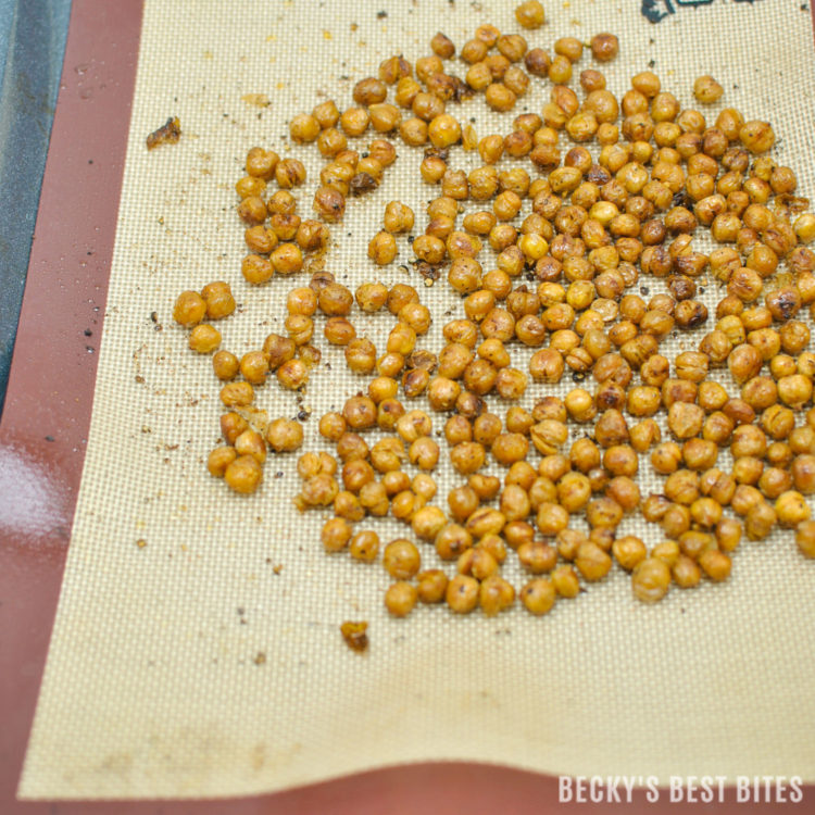 Easy Oven Roasted Chickpeas are a low calorie, protein and fiber rich snack or a nutritious crunchy topping for your favorite salad. | beckysbestbites.com