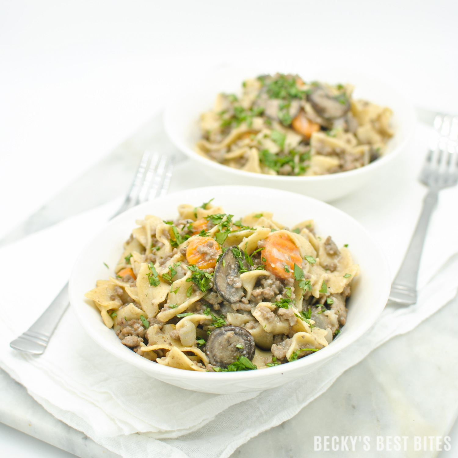 Lean Ground Beef Stroganoff is a healthy weeknight dinner recipe, ready in 30 minutes. Just a few easy and healthier swaps, like greek yogurt and whole grain noodles, make this classic comfort food easier on the waistline. The use of one unique ingredient in this version is the key to the depth of flavor. | beckysbestbites.com