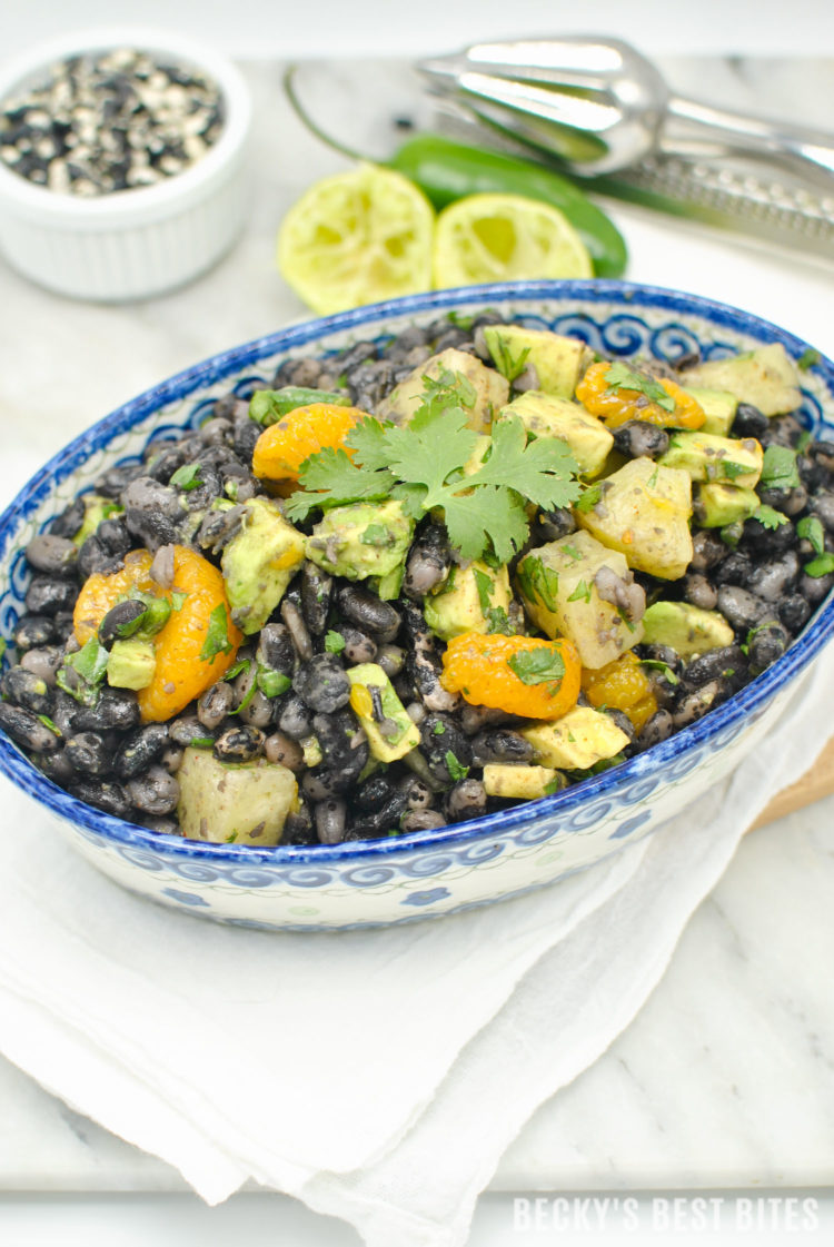 Tropical Cowboy Caviar is a healthy appetizer recipe perfect for Cinco de Mayo celebrations! A unique twist on the popular version featuring orca beans, tropical fruits like pineapple and mandarin oranges & creamy avocado. | beckysbestbites.com