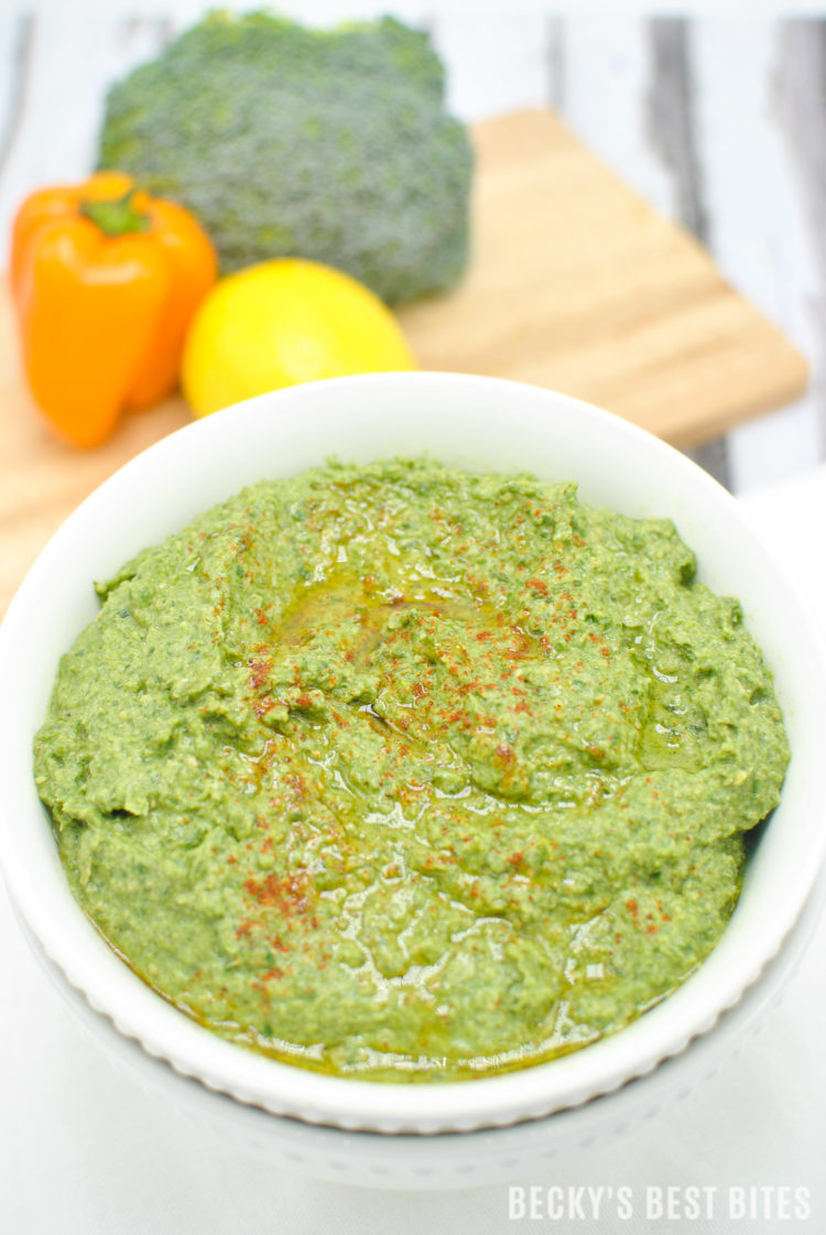 Green Goddess Spinach Hummus is a quick, easy and healthy appetizer or snack recipe perfect for a game day or tailgate spread. Pair it with chopped veggies or homemade pita bread or add it to wraps or sandwiches for an added nutritional boost. | beckysbestbites.com