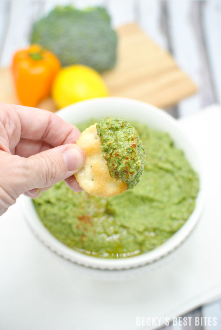 Green Goddess Spinach Hummus is a quick, easy and healthy appetizer or snack recipe perfect for a game day or tailgate spread. Pair it with chopped veggies or homemade pita bread or add it to wraps or sandwiches for an added nutritional boost. | beckysbestbites.com