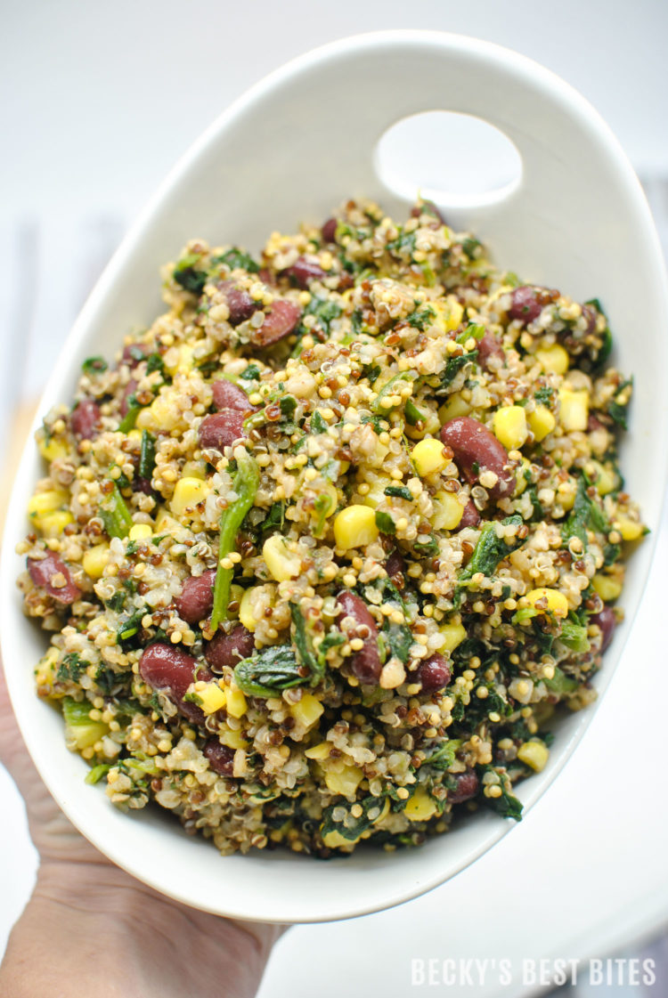 Spinach, Corn, Bean Fiesta Quinoa Bowl with Quick Lemon Dijon Dressing is a quick, easy and healthy vegan lunch or dinner recipe. Super versatile, veggie-filled, protein-rich bowl or salad with zesty summertime flavors that travels well. | beckysbestbites.com