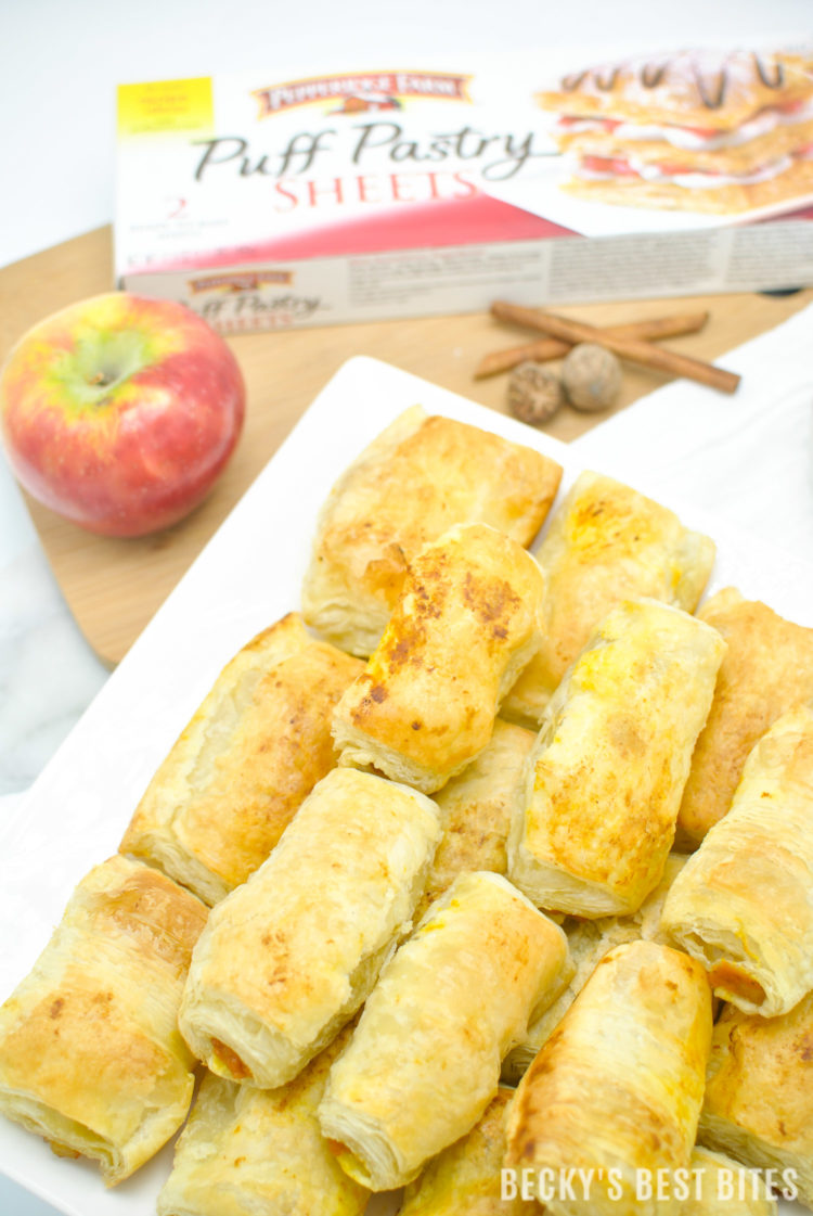 Pumpkin Apple Roll Ups with Cream Cheese Dipper is a quick, easy and delicious dessert recipe that is perfect for "Wow Worthy" entertaining with all the favorite flavors of fall. Pepperidge Farm® Puff Pastry Sheets are the essential ingredient in creating this yummy treat!#InspiredByPuff #ad | beckysbestbites.com