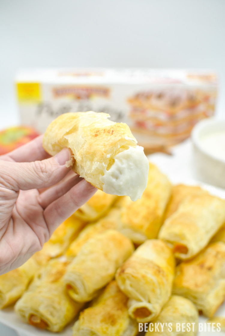 Pumpkin Apple Roll Ups with Cream Cheese Dipper is a quick, easy and delicious dessert recipe that is perfect for "Wow Worthy" entertaining with all the favorite flavors of fall. Pepperidge Farm® Puff Pastry Sheets are the essential ingredient in creating this yummy treat!#InspiredByPuff #ad | beckysbestbites.com