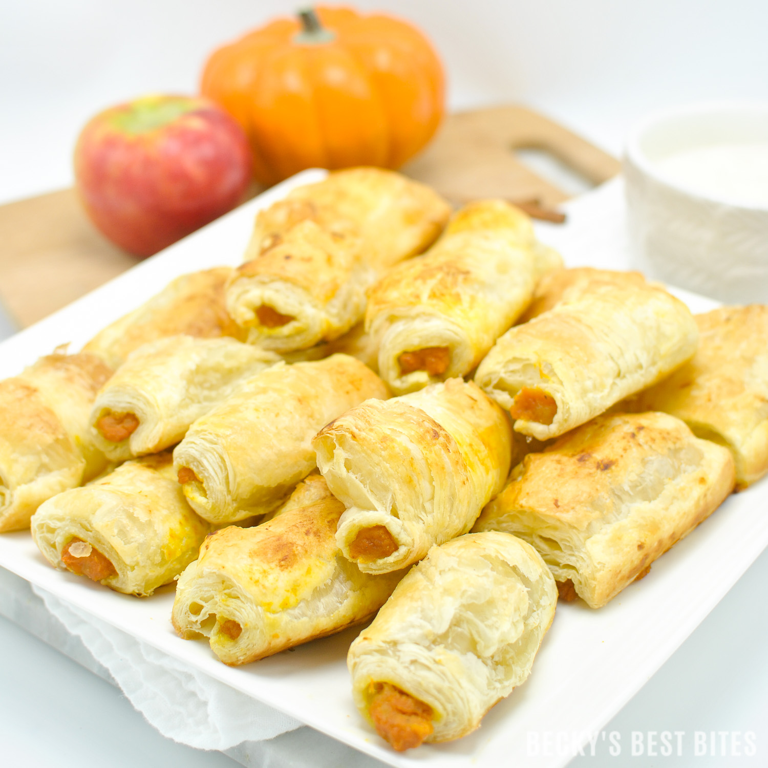 Pumpkin Apple Roll Ups with Cream Cheese Dipper is a quick, easy and delicious dessert recipe that is perfect for "Wow Worthy" entertaining with all the favorite flavors of fall. Pepperidge Farm® Puff Pastry Sheets are the essential ingredient in creating this yummy treat!#InspiredByPuff #ad | beckysbestbites.com