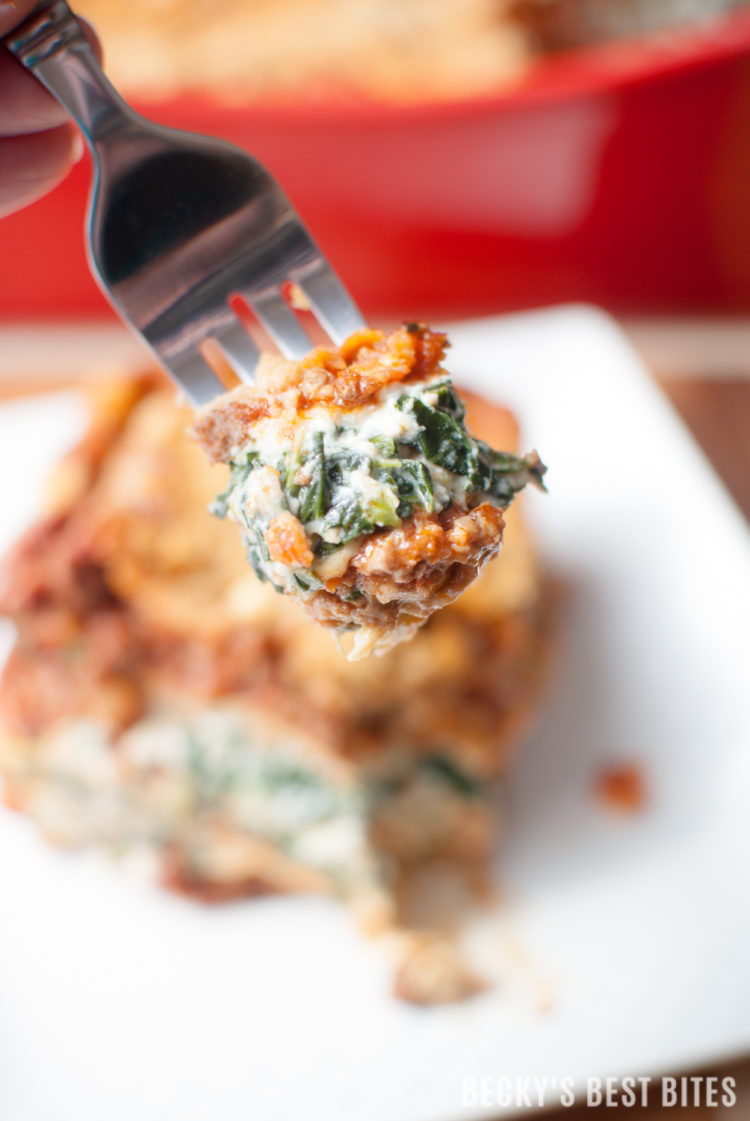 Meat & Veggie Lovers Family Lasagna is the perfect recipe to please a crowd! Ground beef and sausage pair beautifully with garlic, onion, tomatoes, bell peppers, spinach and 3 types of cheeses to make a delicious freezer friendly & make ahead meal that will be requested time and time again. | beckysbestbites.com