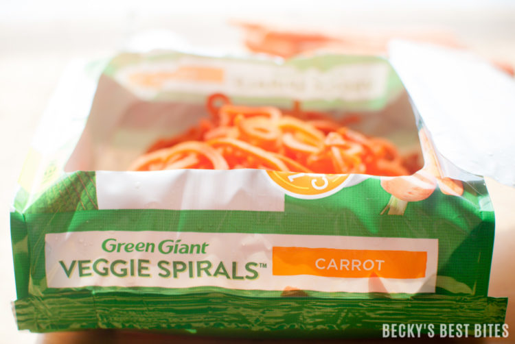 #ad Garlic and Parmesan Carrot Spirals are a colorful, delicious and healthy side dish recipe perfect for your next meal. For added protein and an easy family meal pair this dish with diced grilled chicken, beef, shrimp or pork for an easy dinner on the craziest of nights. #VeggieSwapIns #IC | beckysbestbites.com @greengiant @Walmart 