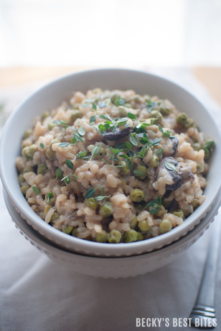 Sweet Pea & Mushroom Risotto is a surprisingly easy recipe that is ready in 30 minutes or less. Delicious as a vegetarian main dish or as a side dish along side of your favorite protein. Learn just how simple and yummy risotto is and win over your family or friends with this impressive dish! | beckysbestbites.com