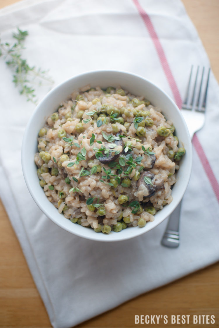 Sweet Pea & Mushroom Risotto is a surprisingly easy recipe that is ready in 30 minutes or less. Delicious as a vegetarian main dish or as a side dish along side of your favorite protein. Learn just how simple and yummy risotto is and win over your family or friends with this impressive dish! | beckysbestbites.com