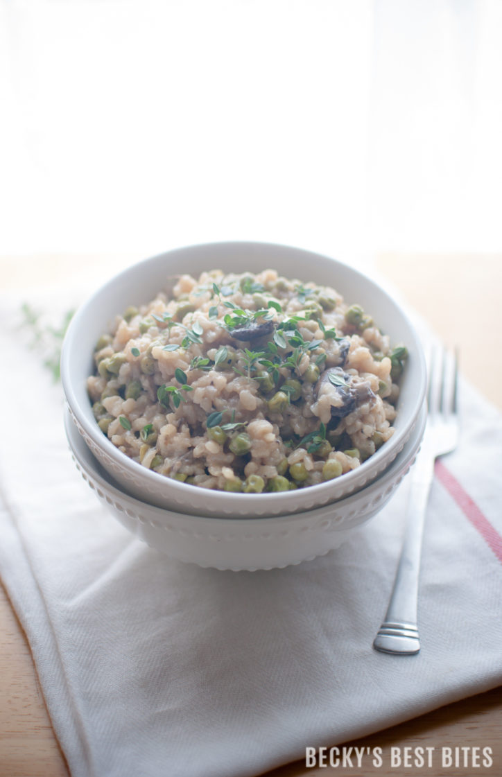 Sweet Pea & Mushroom Risotto is a surprisingly easy recipe that is ready in 30 minutes or less. Delicious as a vegetarian main dish or as a side dish along side of your favorite protein. Learn just how simple and yummy risotto is and win over your family or friends with this impressive dish! | beckysbestbites.com