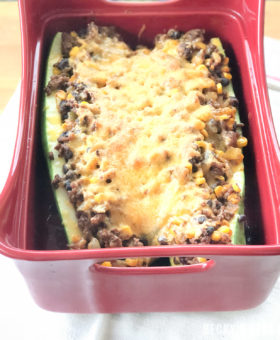 Healthy Zucchini Taco Boats is a healthy and easy dinner recipe that the whole family will love! This favorite summer vegetable is stuffed with taco-flavored filling that also includes corn and black beans for an extra nutritional bonus! | beckysbestbites.com