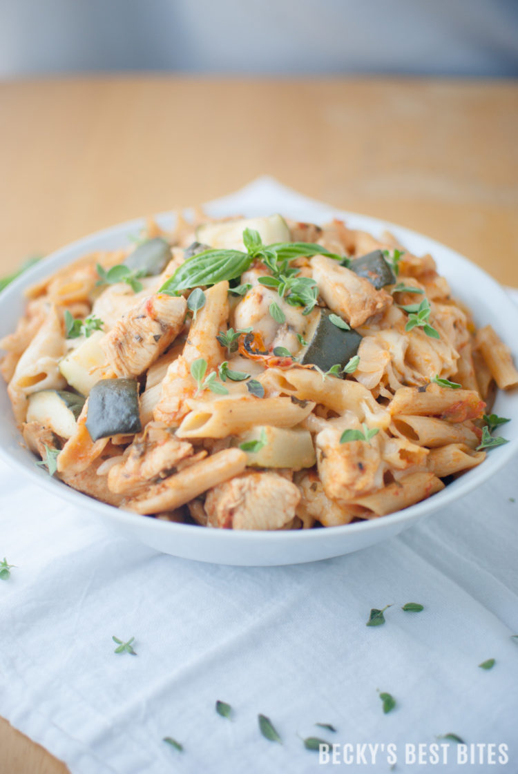 Skillet Chicken Parmesan with Zucchini an easy and healthy recipe that the whole family will love! This one-pan meal combines summer fresh vegetables and herbs with lean, boneless chicken breast & whole wheat pasta and is topped with ooey gooey cheese! | beckysbestbites.com